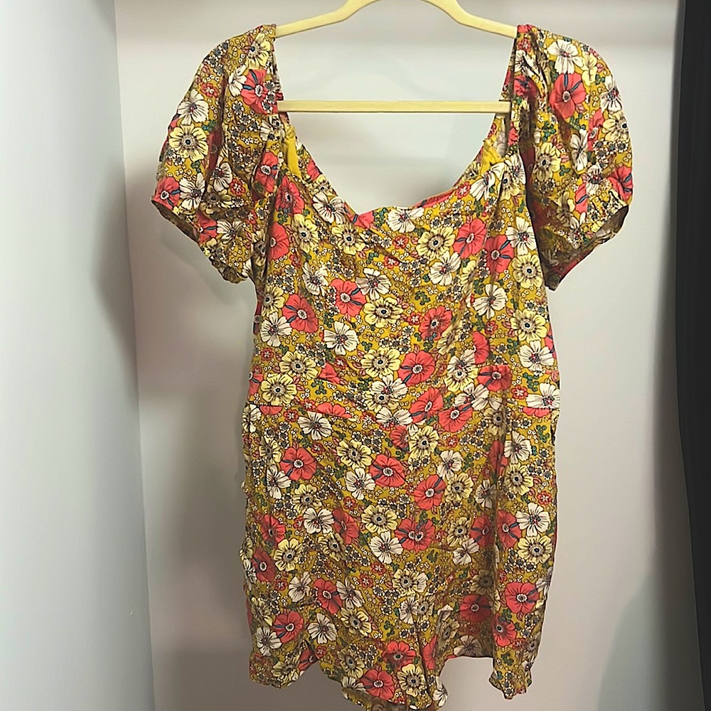 Floral romper, no holes or rips